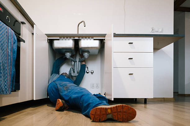 Professional Drain Cleaning technician working in Brent, FL